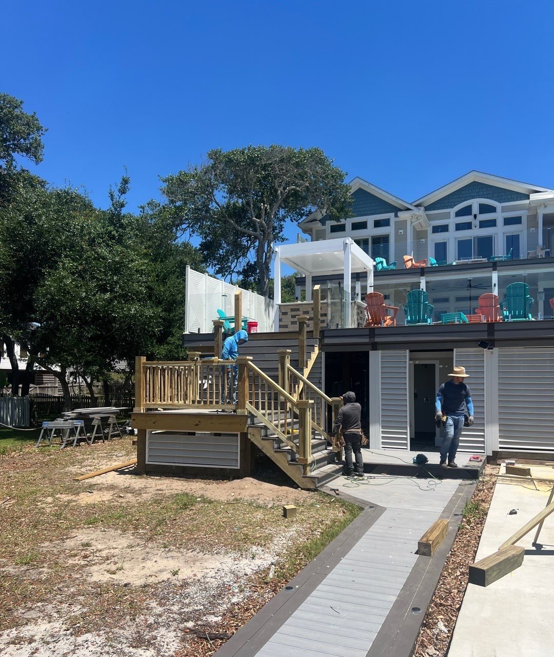 Rebuilt exterior stairs beside the elevated coastal home in Oak Island, NC