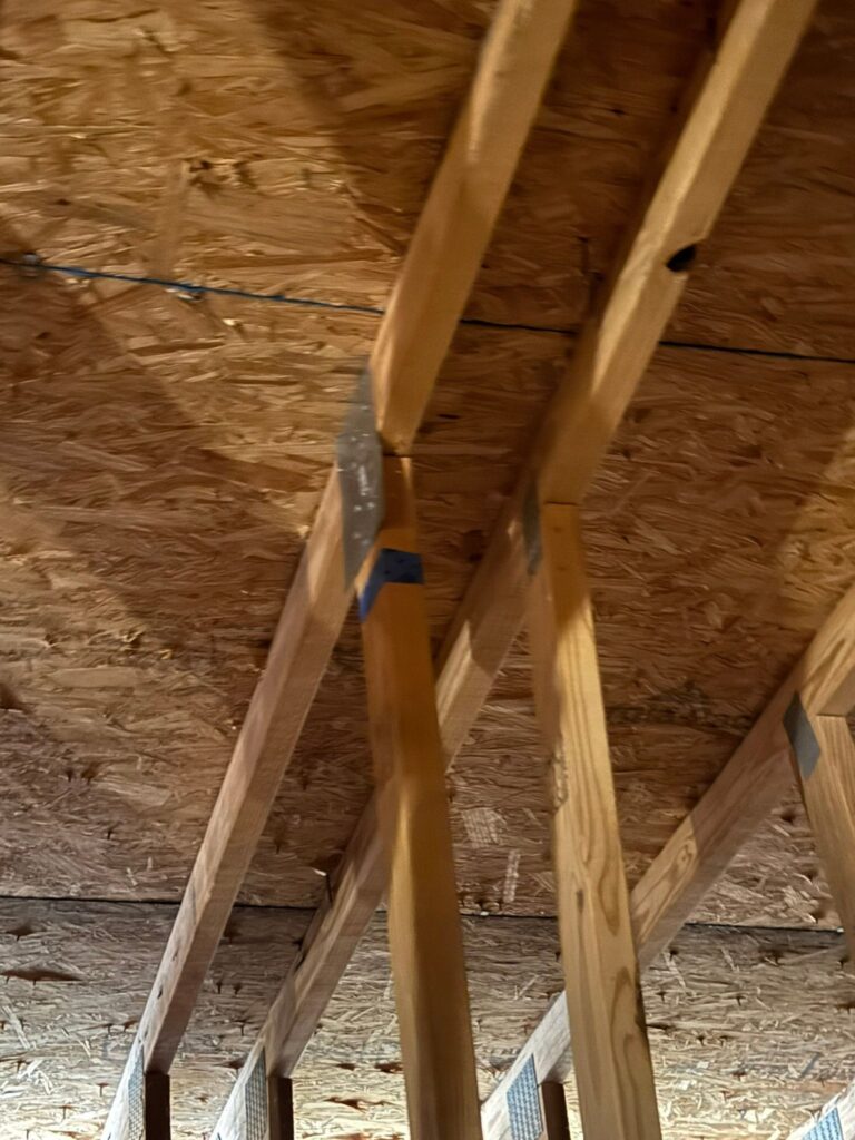 Wood framing repair beneath the OSB roof sheathing in Sunset Beach, NC