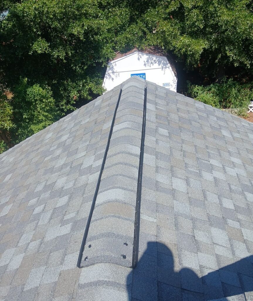 Roof ridge caps viewed toward the neighboring home in Oak Island, NC