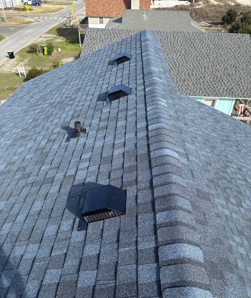 Installed roof ridge with vents along the slope in Oak Island, NC