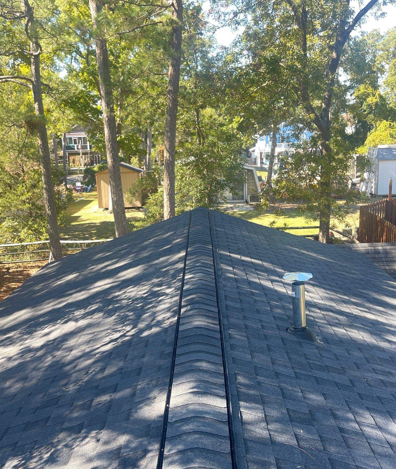 Shingled ridge on the upper roof section in Oak Island, NC